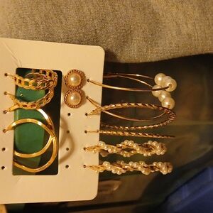 Pierced gold tone earrings, set 4